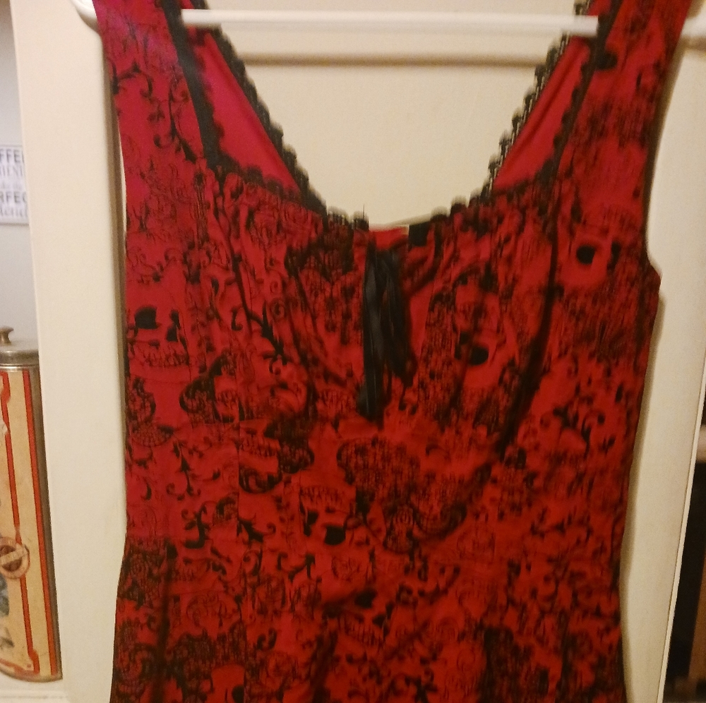 red dress with black skulls as pattern from hot topic